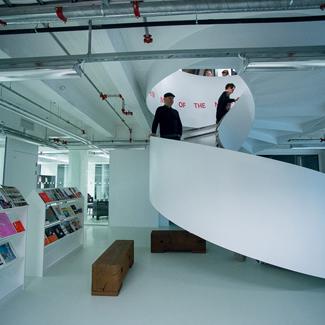 Photo of a stairway and shelfs
