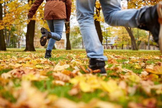 17977849-young-couple-running-in-autumn-park.jpg