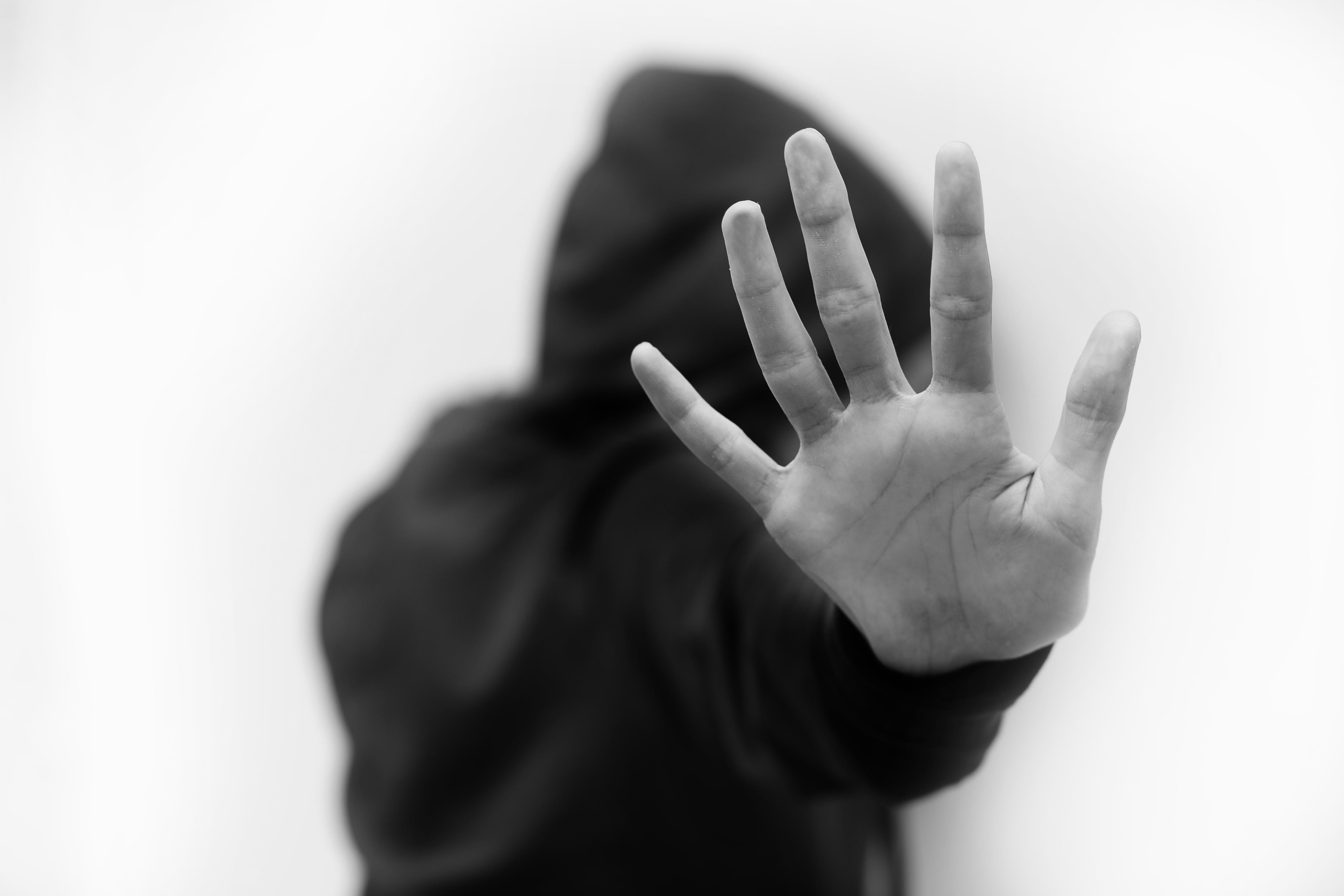48983862-girl-saying-stop-violence-with-black-and-white-effect.jpg