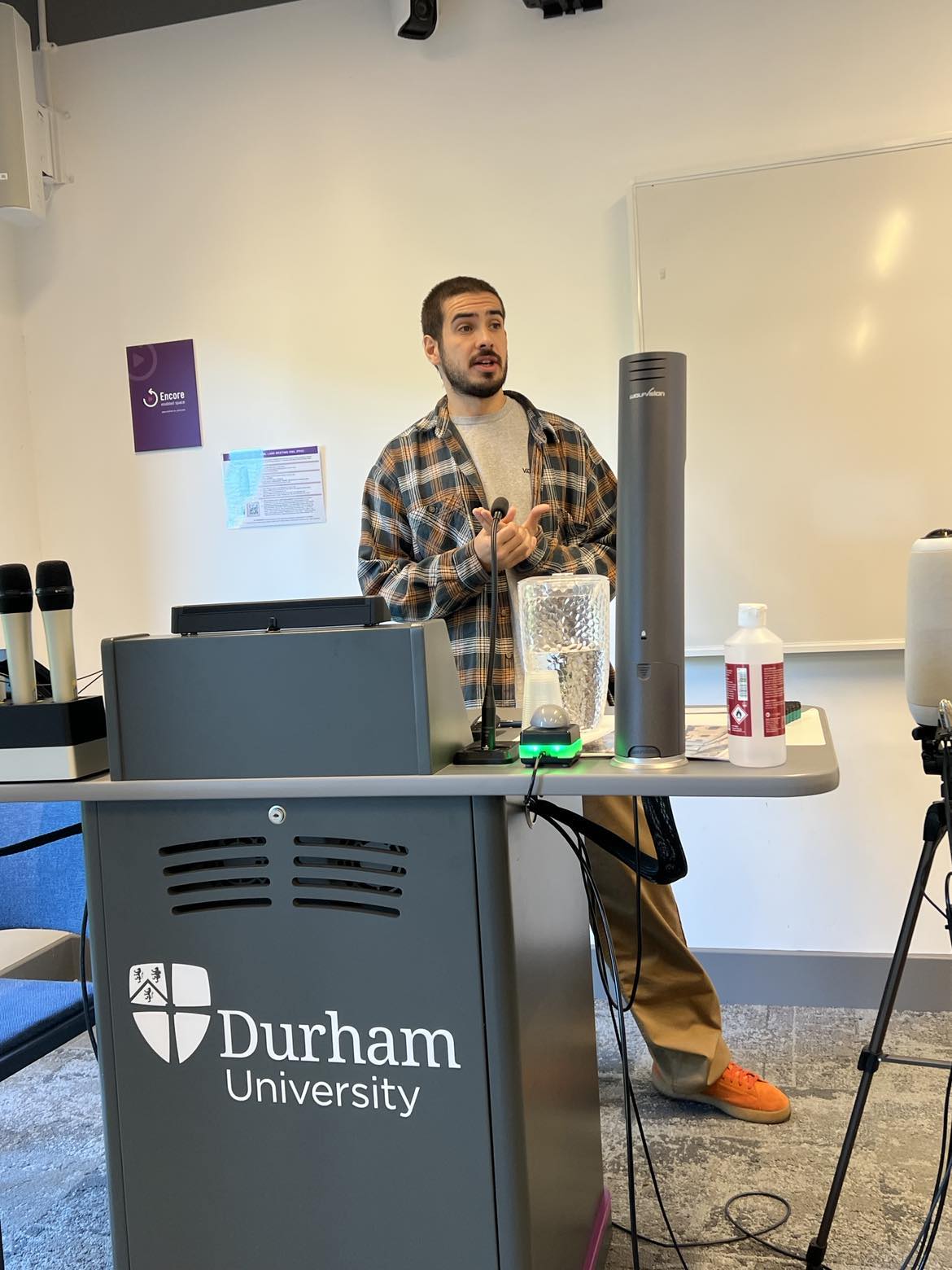 Apostolos Tsiuovalas presenting in a class room