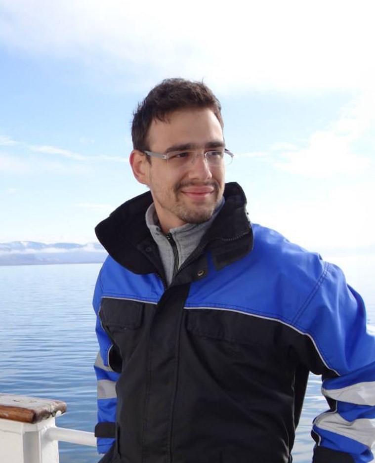Nikolaos smiling at the camera. 