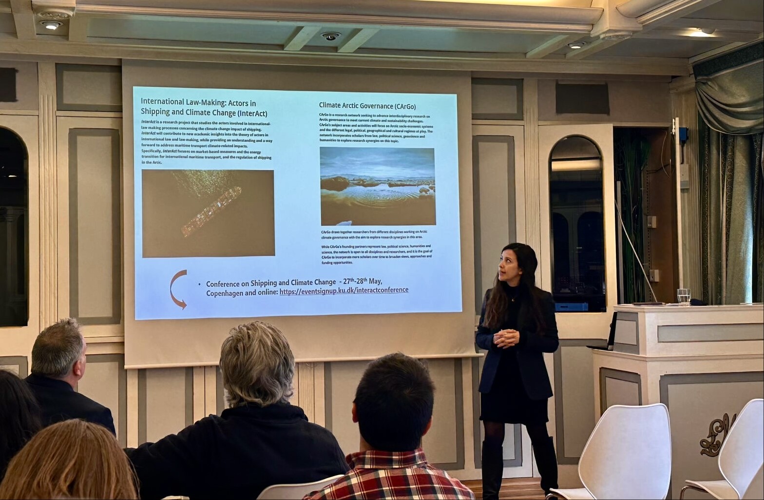 She is holding a presentation on climate change and arctic governance. 