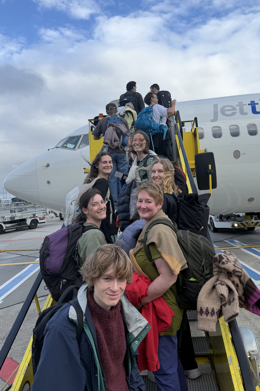 Many people entering a plane