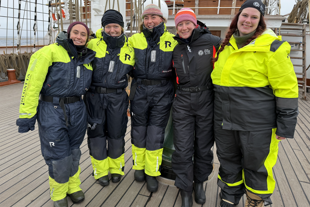 Five persons beside each other