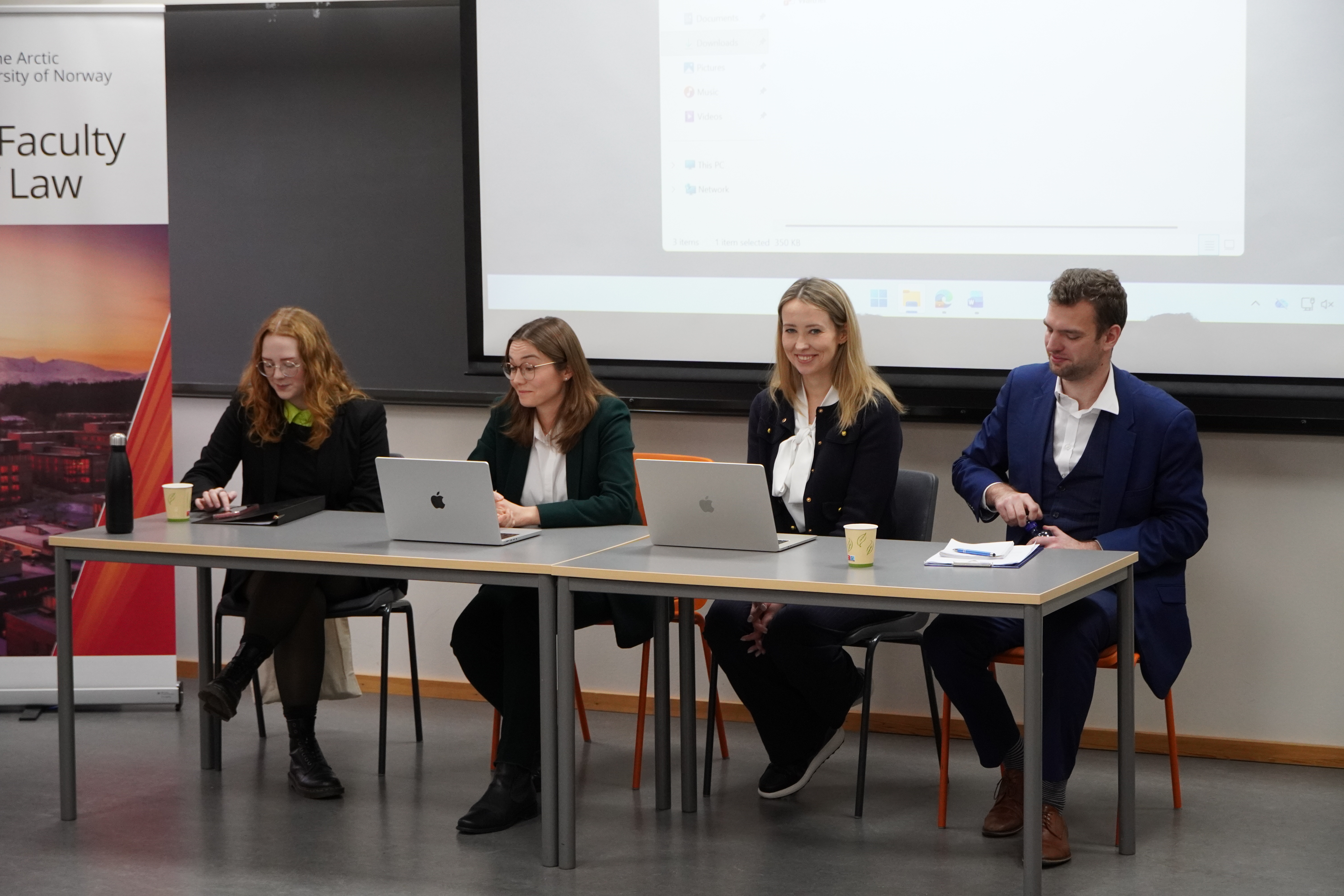 The panel is recieving questions from the audience